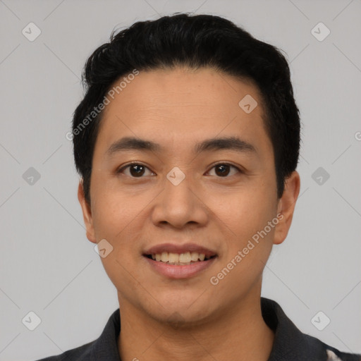 Joyful latino young-adult male with short  black hair and brown eyes