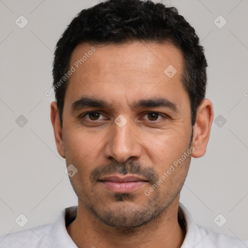 Neutral white young-adult male with short  black hair and brown eyes