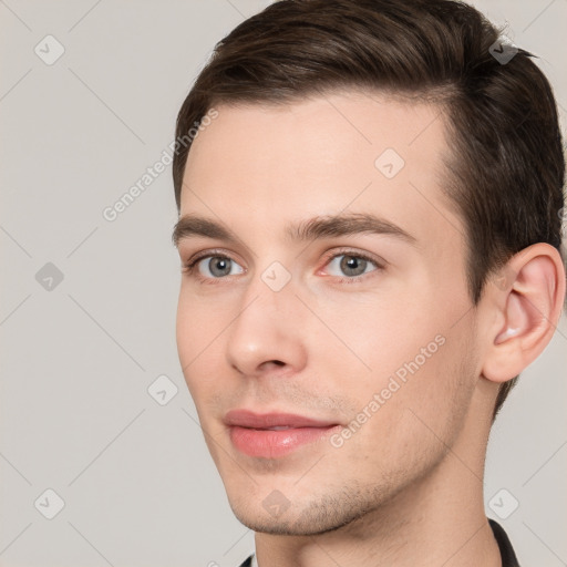 Neutral white young-adult male with short  brown hair and brown eyes