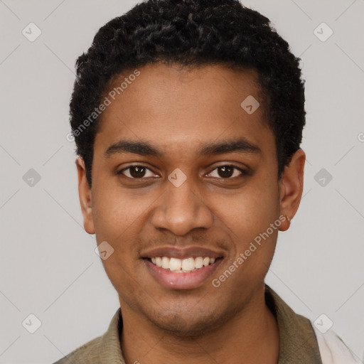 Joyful black young-adult male with short  black hair and brown eyes