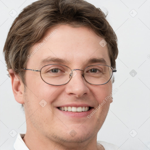 Joyful white adult male with short  brown hair and grey eyes