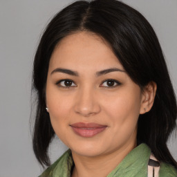 Joyful asian young-adult female with medium  brown hair and brown eyes