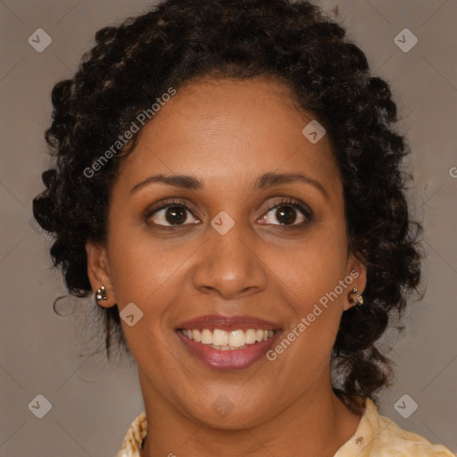 Joyful black young-adult female with medium  brown hair and brown eyes