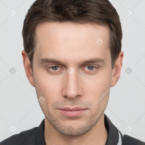 Neutral white young-adult male with short  brown hair and brown eyes