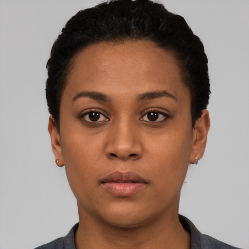 Neutral latino young-adult female with short  black hair and brown eyes