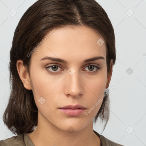 Neutral white young-adult female with medium  brown hair and brown eyes