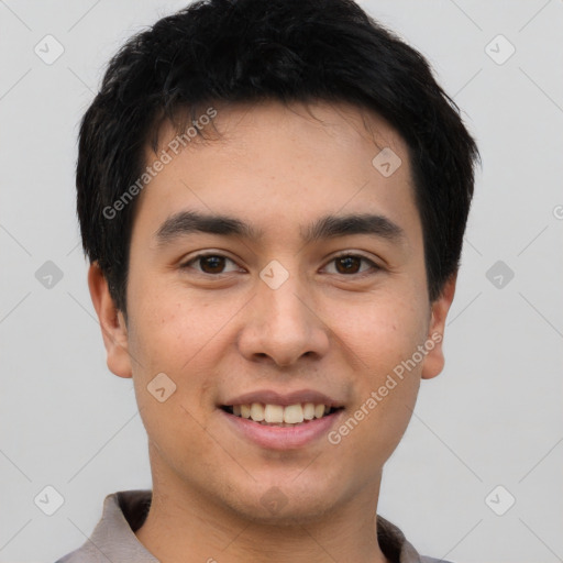 Joyful white young-adult male with short  black hair and brown eyes