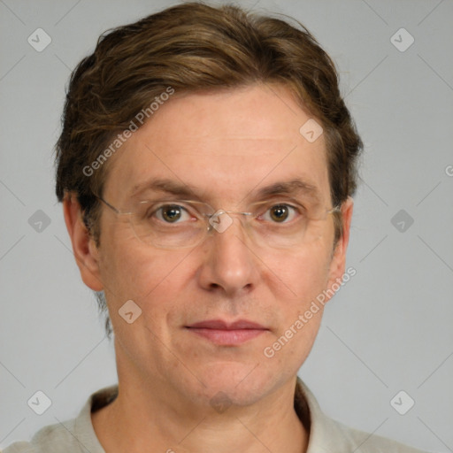 Joyful white adult male with short  brown hair and grey eyes