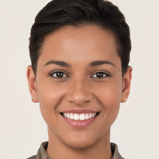 Joyful white young-adult female with short  brown hair and brown eyes