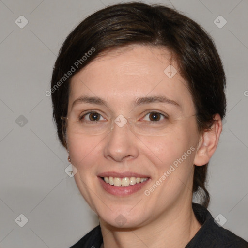 Joyful white adult female with medium  brown hair and brown eyes