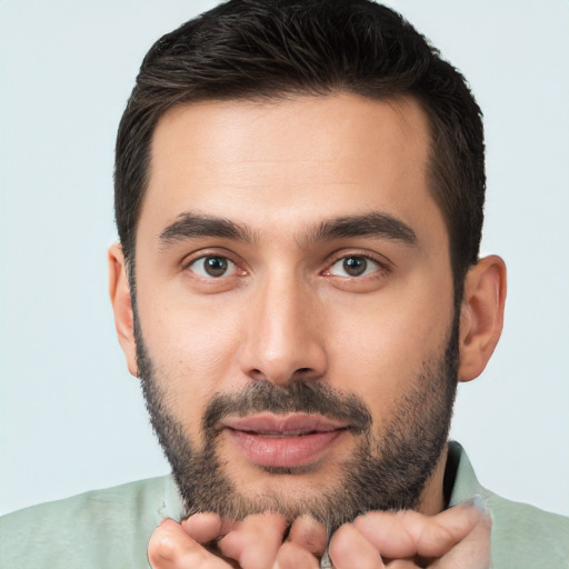 Neutral white young-adult male with short  black hair and brown eyes