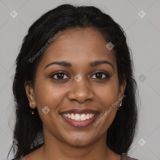 Joyful black young-adult female with medium  brown hair and brown eyes