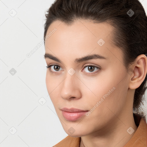 Neutral white young-adult female with long  brown hair and brown eyes