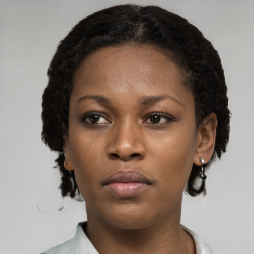 Neutral black young-adult female with short  brown hair and brown eyes