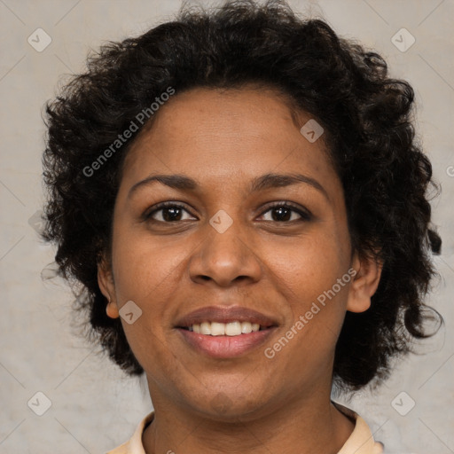 Joyful black young-adult female with short  brown hair and brown eyes