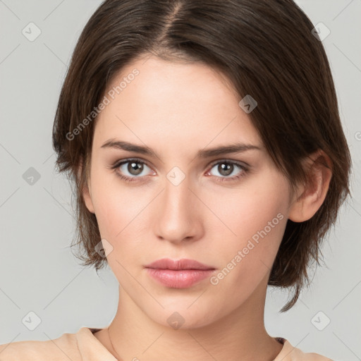 Neutral white young-adult female with medium  brown hair and brown eyes