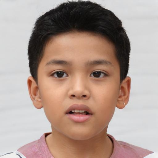 Neutral asian child male with short  brown hair and brown eyes