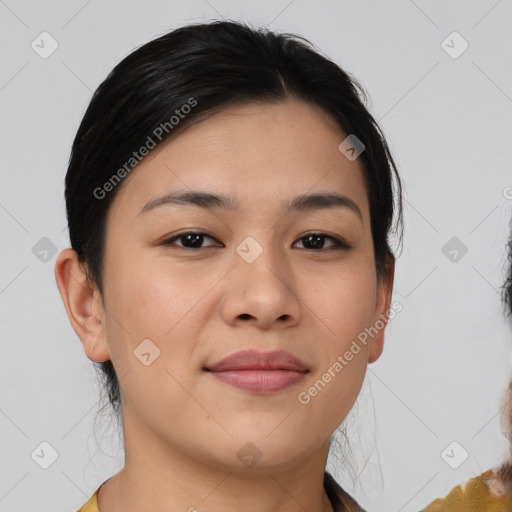 Joyful latino young-adult female with medium  black hair and brown eyes