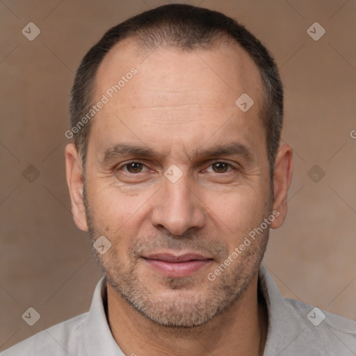 Joyful white adult male with short  brown hair and brown eyes