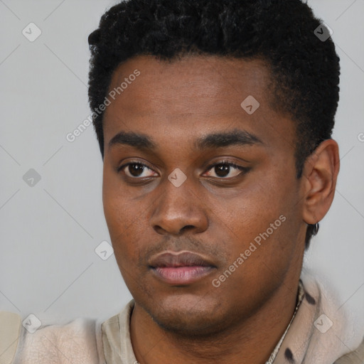 Neutral black young-adult male with short  black hair and brown eyes