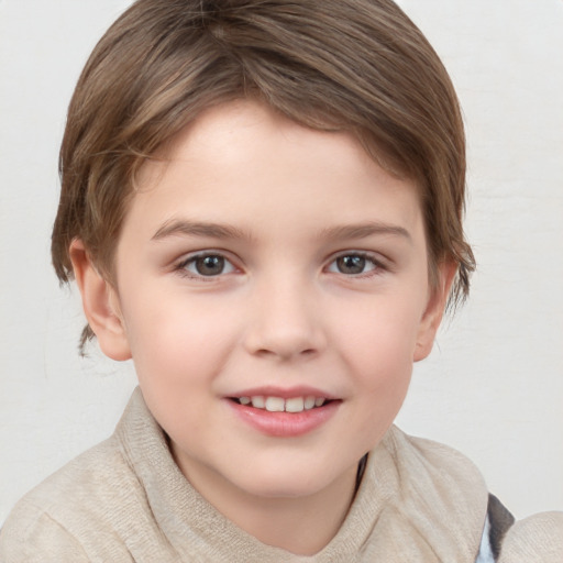 Joyful white child female with short  brown hair and brown eyes