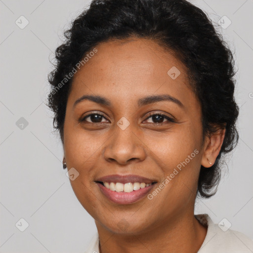 Joyful latino young-adult female with short  black hair and brown eyes