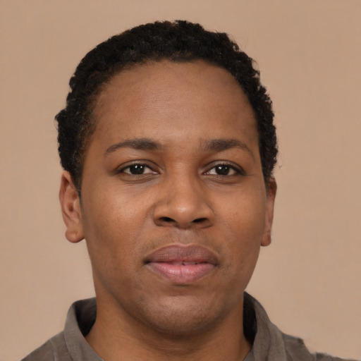 Neutral black young-adult female with short  black hair and brown eyes