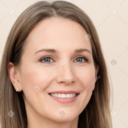 Joyful white young-adult female with long  brown hair and grey eyes