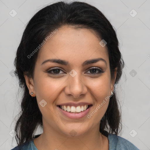 Joyful latino young-adult female with medium  brown hair and brown eyes