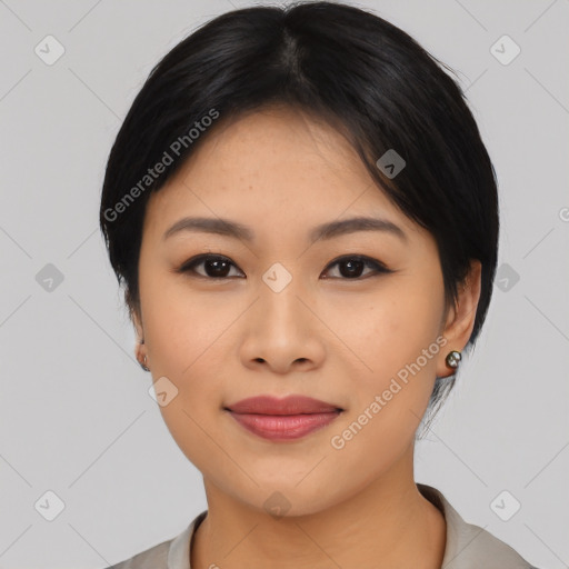 Joyful asian young-adult female with medium  black hair and brown eyes