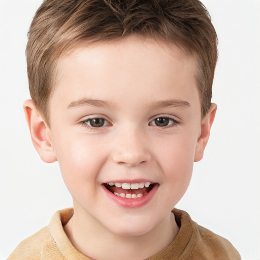 Joyful white child male with short  brown hair and brown eyes