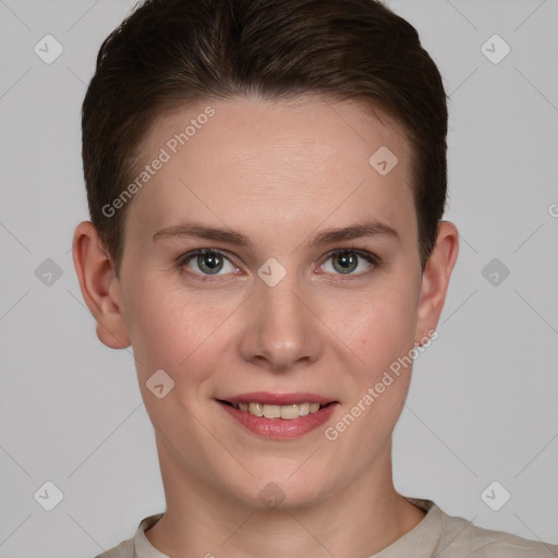 Joyful white young-adult female with short  brown hair and grey eyes