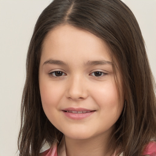 Joyful white child female with long  brown hair and brown eyes