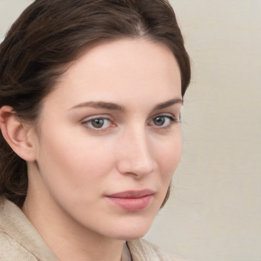 Neutral white young-adult female with medium  brown hair and grey eyes