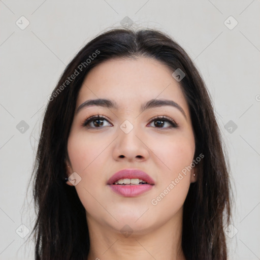 Joyful asian young-adult female with long  brown hair and brown eyes