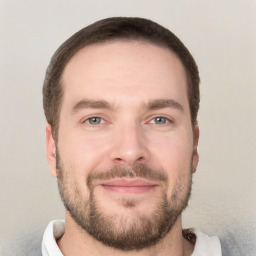 Joyful white young-adult male with short  brown hair and grey eyes