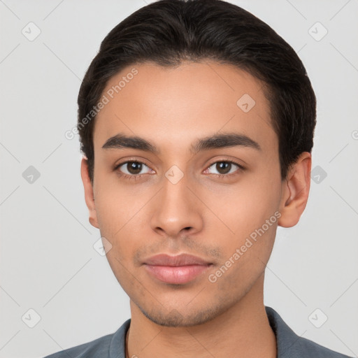 Neutral latino young-adult male with short  brown hair and brown eyes