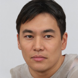 Neutral asian young-adult male with short  brown hair and brown eyes