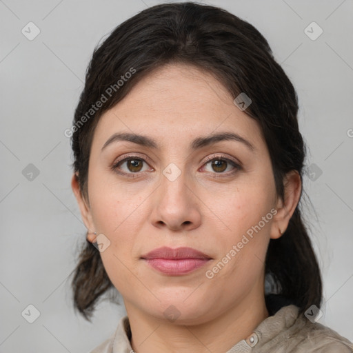 Joyful white young-adult female with medium  brown hair and grey eyes