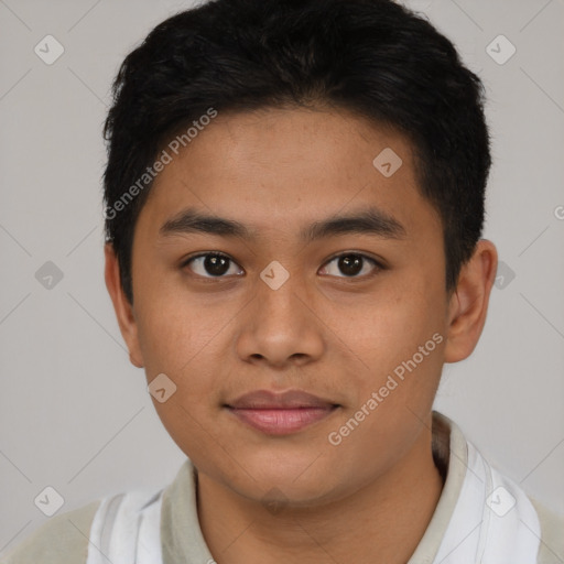 Joyful asian young-adult male with short  brown hair and brown eyes