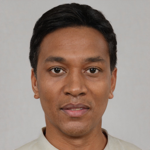 Neutral black adult male with short  black hair and brown eyes