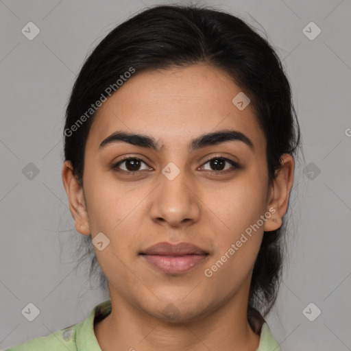 Joyful latino young-adult female with medium  brown hair and brown eyes