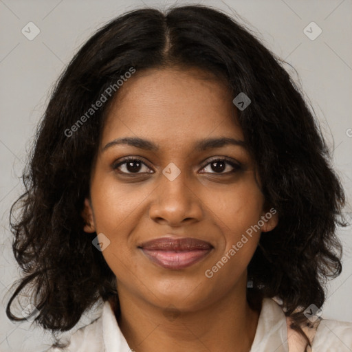 Joyful black young-adult female with medium  brown hair and brown eyes