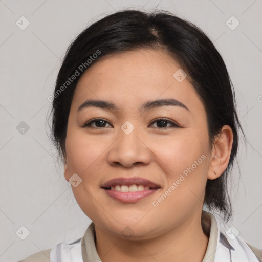 Joyful latino young-adult female with medium  black hair and brown eyes