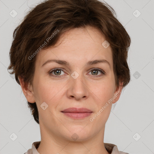 Joyful white adult female with short  brown hair and grey eyes