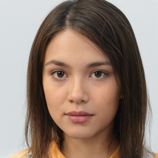 Neutral white young-adult female with long  brown hair and brown eyes