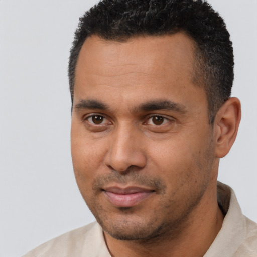 Neutral black young-adult male with short  brown hair and brown eyes