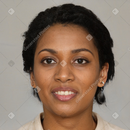 Joyful black young-adult female with medium  black hair and brown eyes