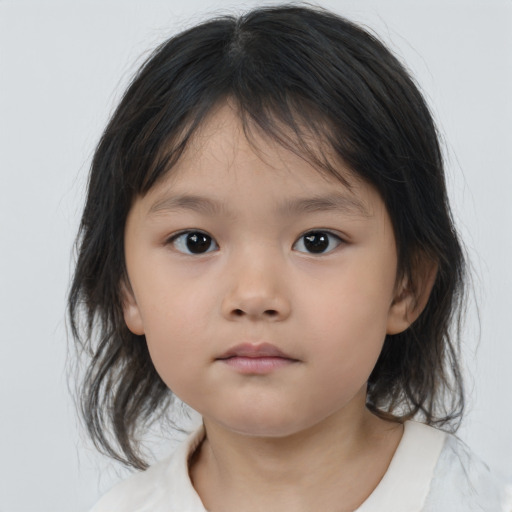 Neutral asian child female with medium  brown hair and brown eyes