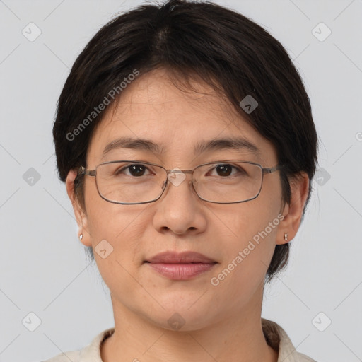 Joyful white adult female with short  brown hair and brown eyes